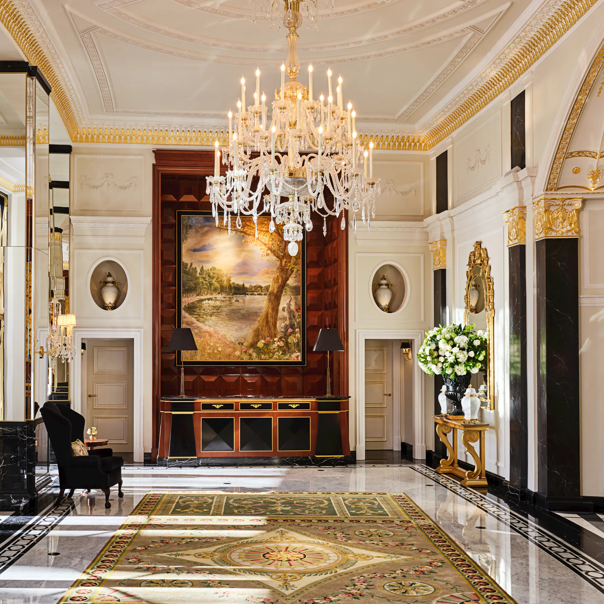 Morning light in The Dorchester's black and white marble lobby.