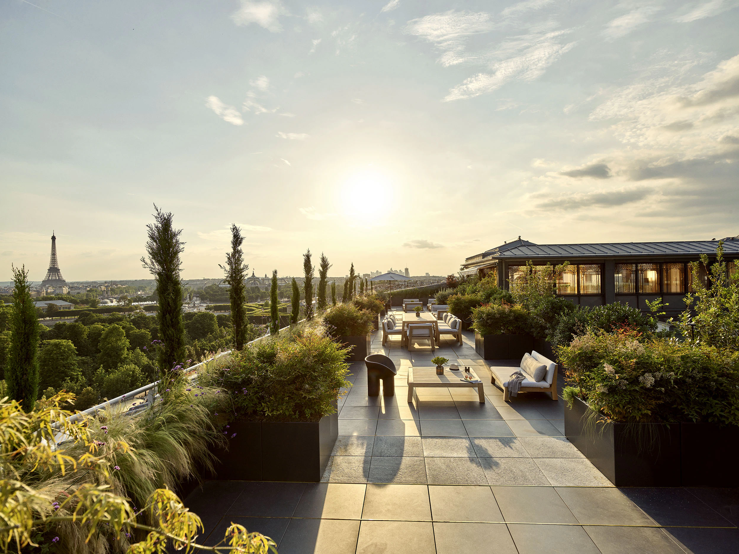The Eiffel Tower and Paris skyline at sunset from the rooftop terrace of the penthouse suite at Le Meurice.