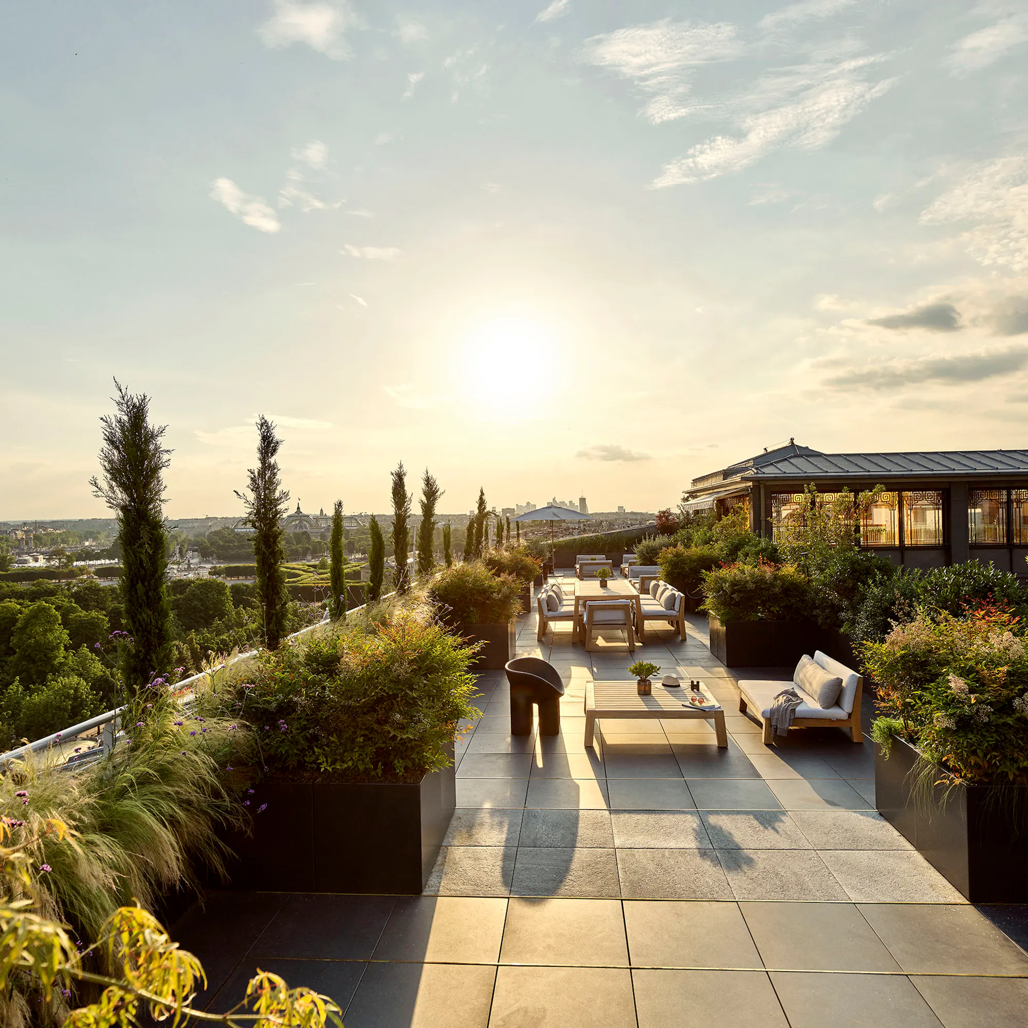 The Eiffel Tower and Paris skyline at sunset from the rooftop terrace of the penthouse suite at Le Meurice.